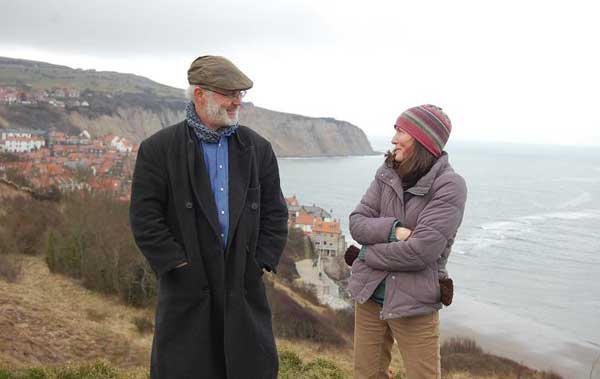 Philip and Helen chatting at Robin Hood's Bay on an appropriately grey day