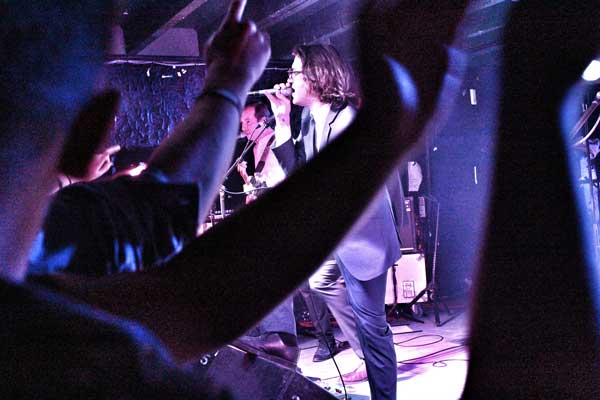 spector-review-with-crowd