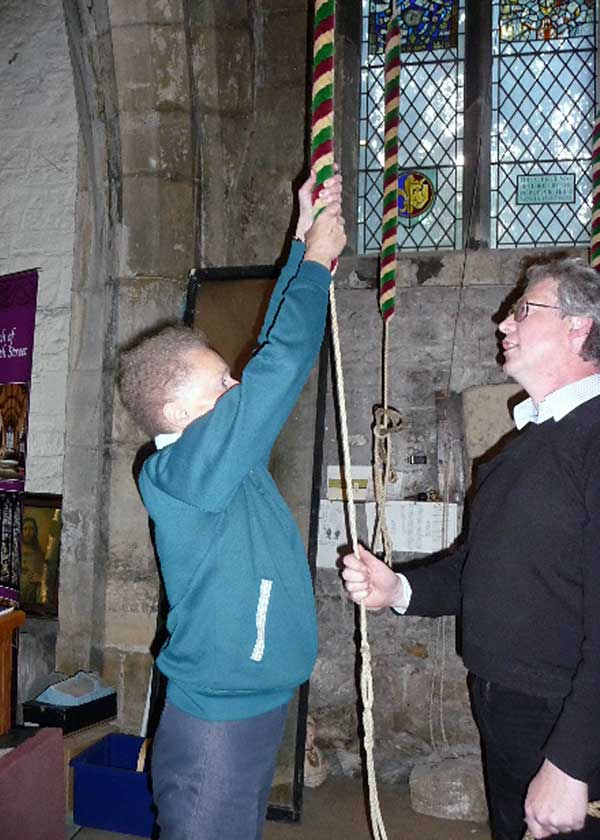 Sue tries her hand at bell ringing