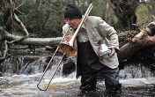 Review: The trombonist up to his slide in sewage