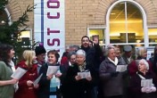 TV star Jason Manford joins charity carol singers at York station