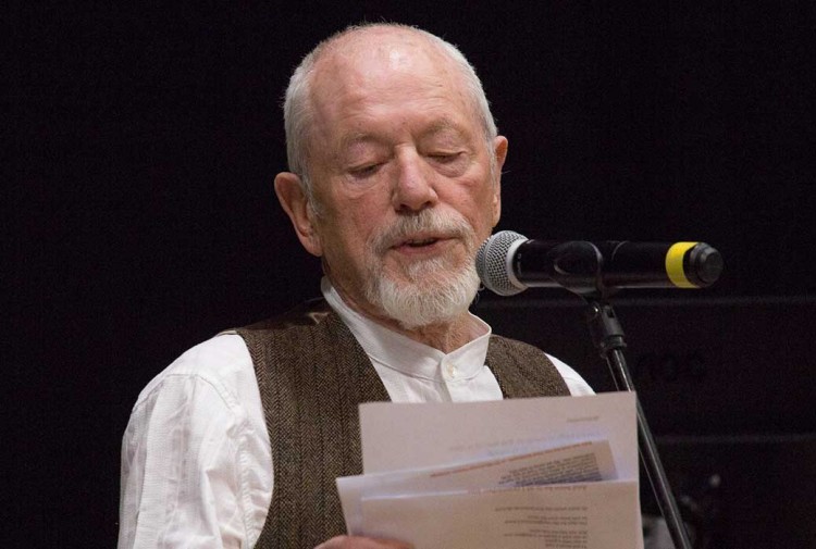 John Foggin reads his poem at the awards ceremony