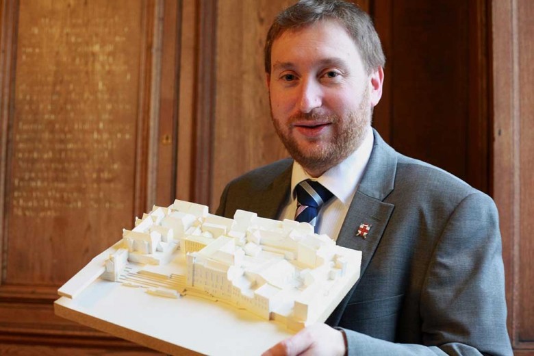 Former council leader Dafydd Williams with a model of the Guildhall. Photograph: City of York Council 