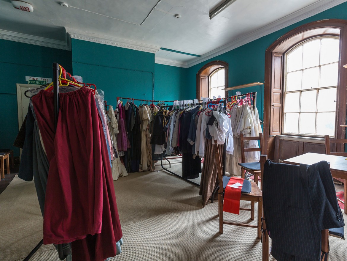 Colourful costumes in the former showroom