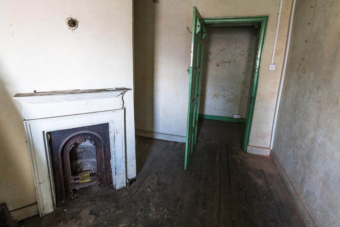 One of the old rooms with original fireplace