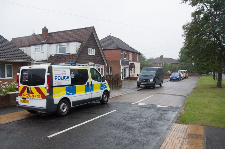 More police vans parked nearby