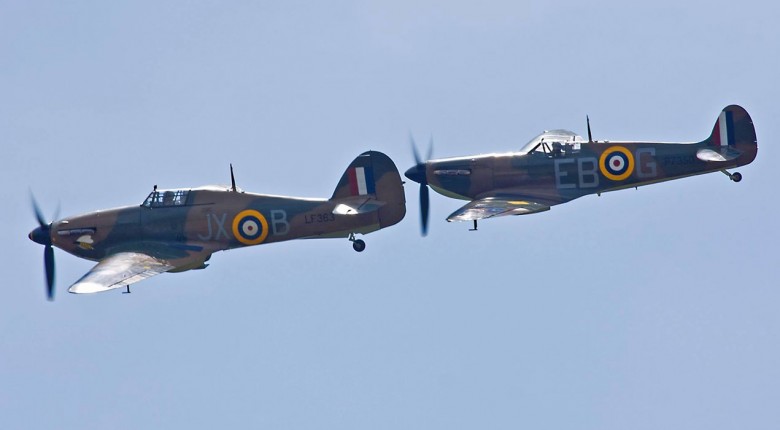 Two Spitfires in mid flight. Photograph © Battle Of Britain Memorial Flight