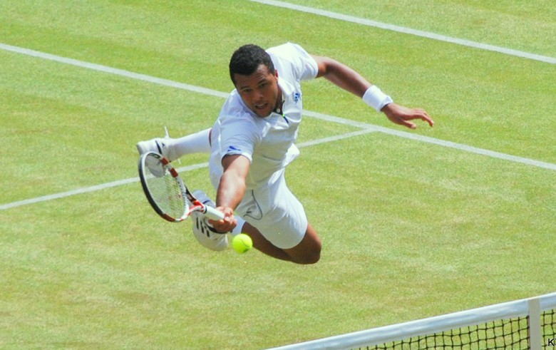 Jo-Wilfried Tsonga in action at Wimbledon in 2011. Photograph © Kate on Flickr