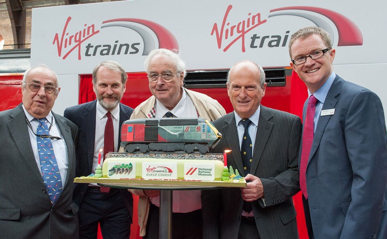 A very special birthday cake. From left: NRM volunteer David Eastoe; NRM dIrector Paul Kirkman; NRM volunteers Peter Brumby and Rob Tibbits; and Virgin Trains East Coast MD David Horne