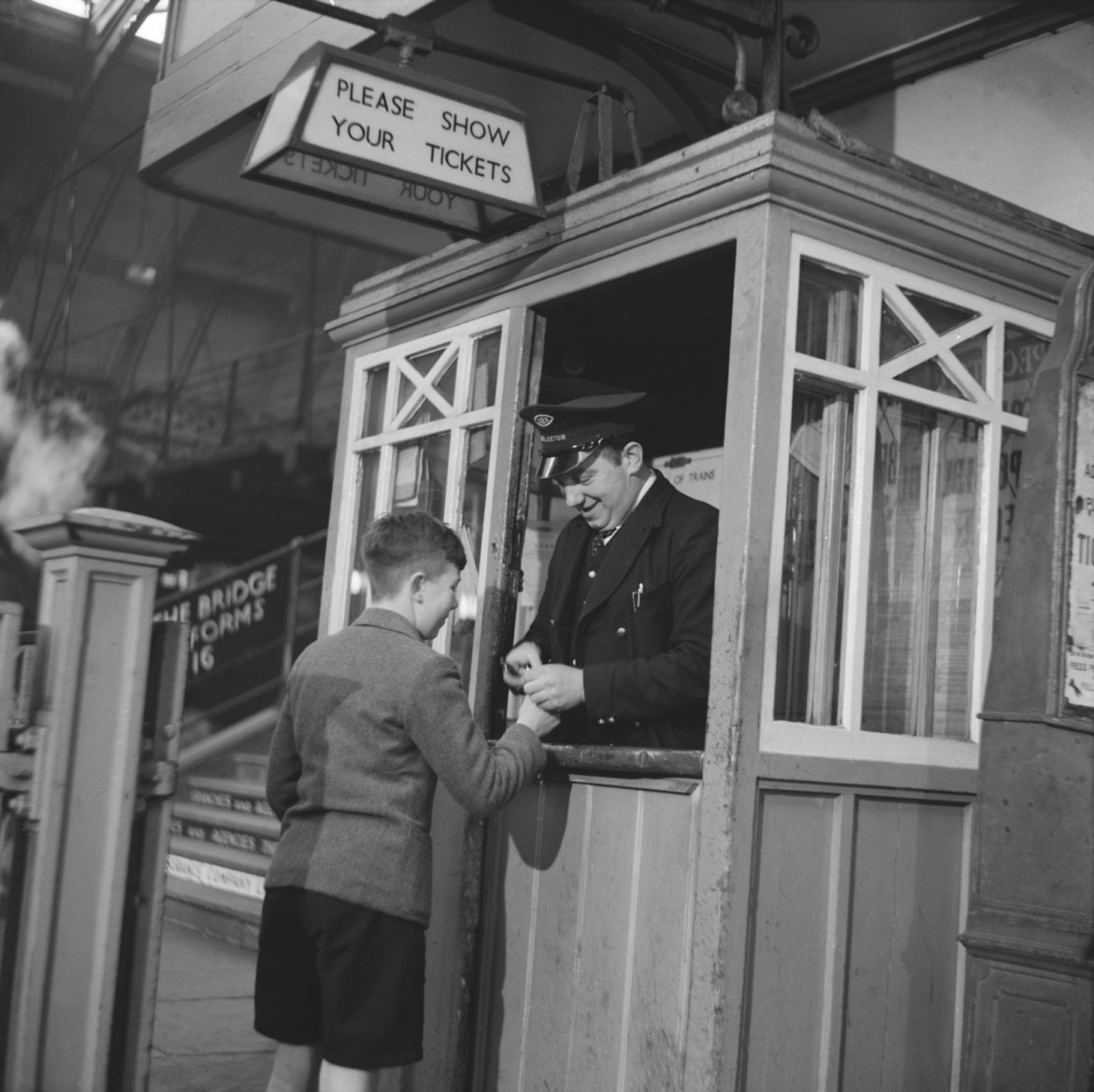 Tickets please: a young passenger heads off on his travels from York station in 1950
