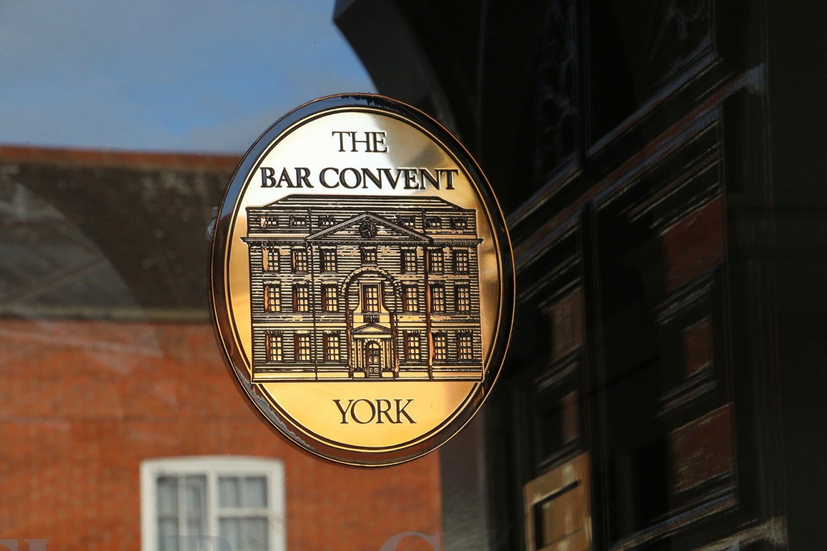 The shiny brass plaque at the convent