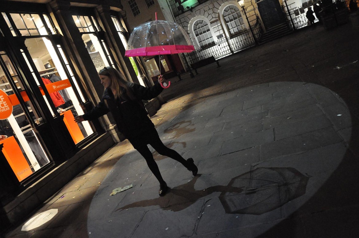 A figure and her shadow in St Helen's Square…