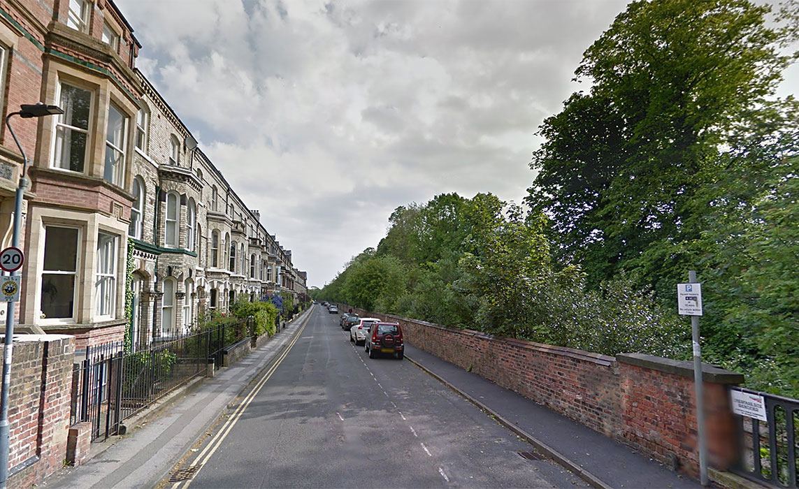 Boy, 12, rescued from second floor window after York house fire