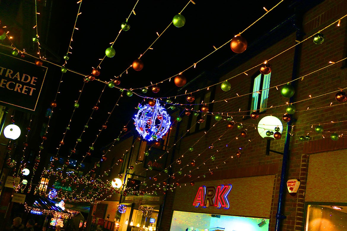 A string of lights leading down to the Coppergate Centre