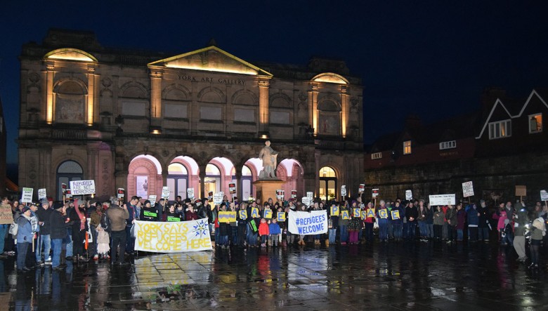 A candlelit vigil for refugees in Exhibition Square, November 2015