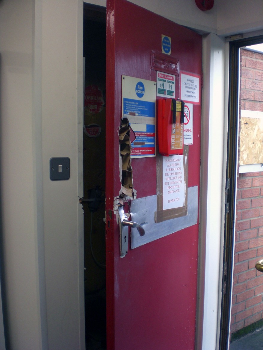 One of the damaged doors