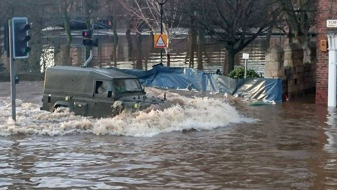 York floods latest: Army on streets sandbagging properties, residents rescued, 27 new photographs