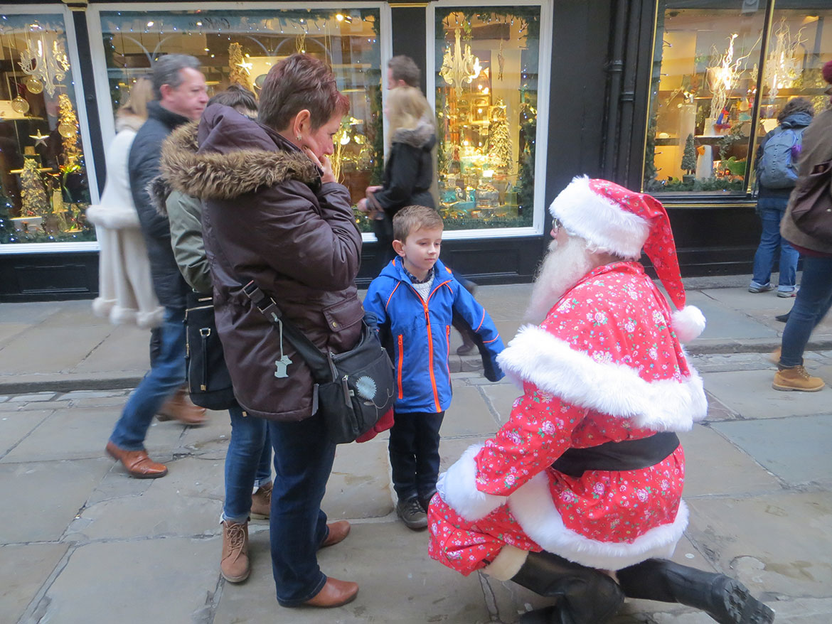 A floral Father Christmas on Stonegate