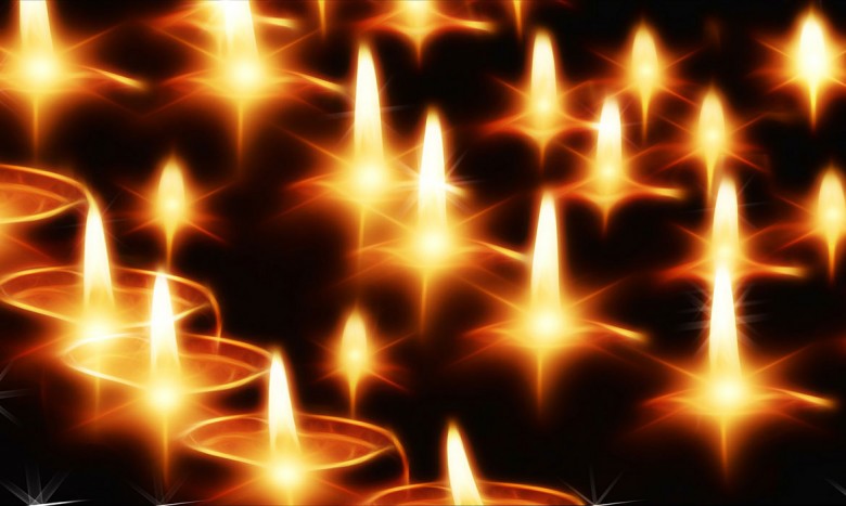 A candle-lit commemoration in the Chapter House. Photograph © geralt