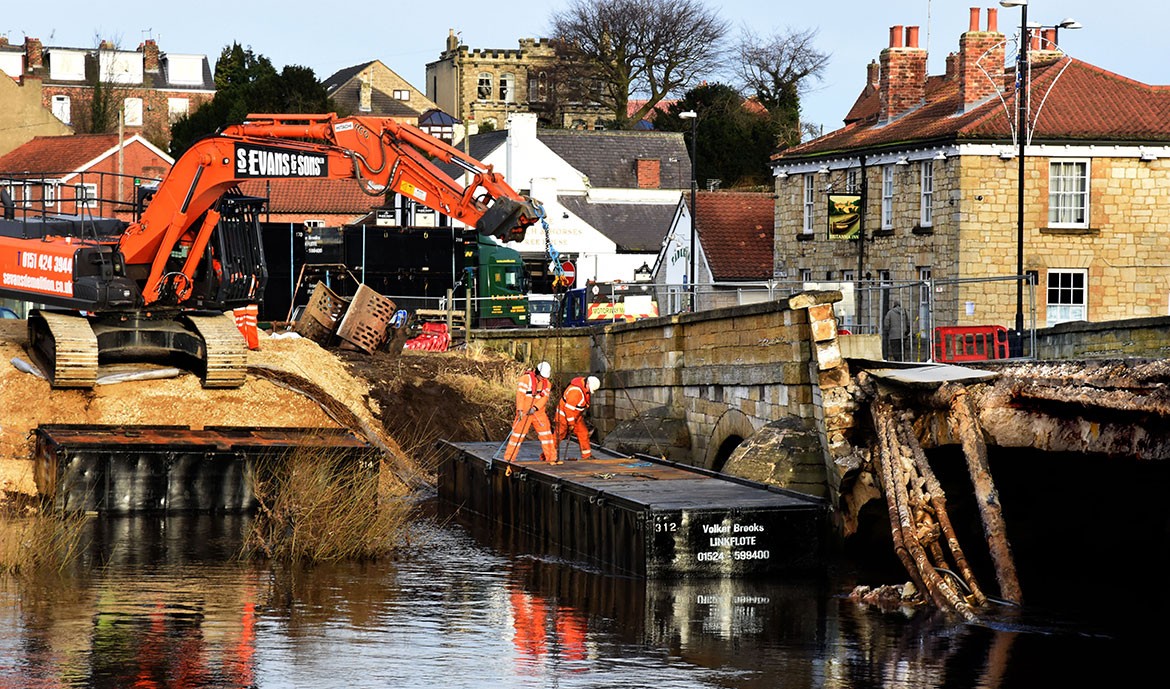 The pontoon allows engineers to inspect the bridge up close
