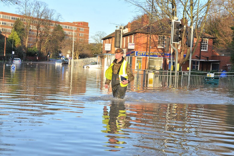 A soldier at the height of the floods. Photograph: Nigel Holland