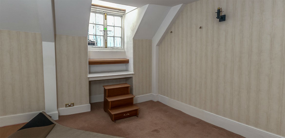Steps up to the window on the third floor