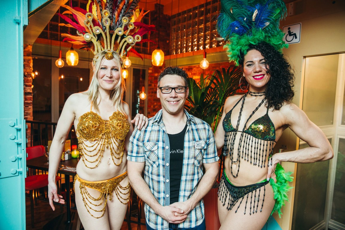 Simon Hudson of Minster FM with Las Iguanas salsa dancers Laucinda and Nina. Photograph: Tom Joy Photography