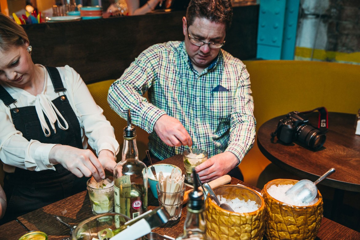 Our man Richard McDougall and wife Vanessa get to grips with caipirinhas. Photograph: Tom Joy Photography