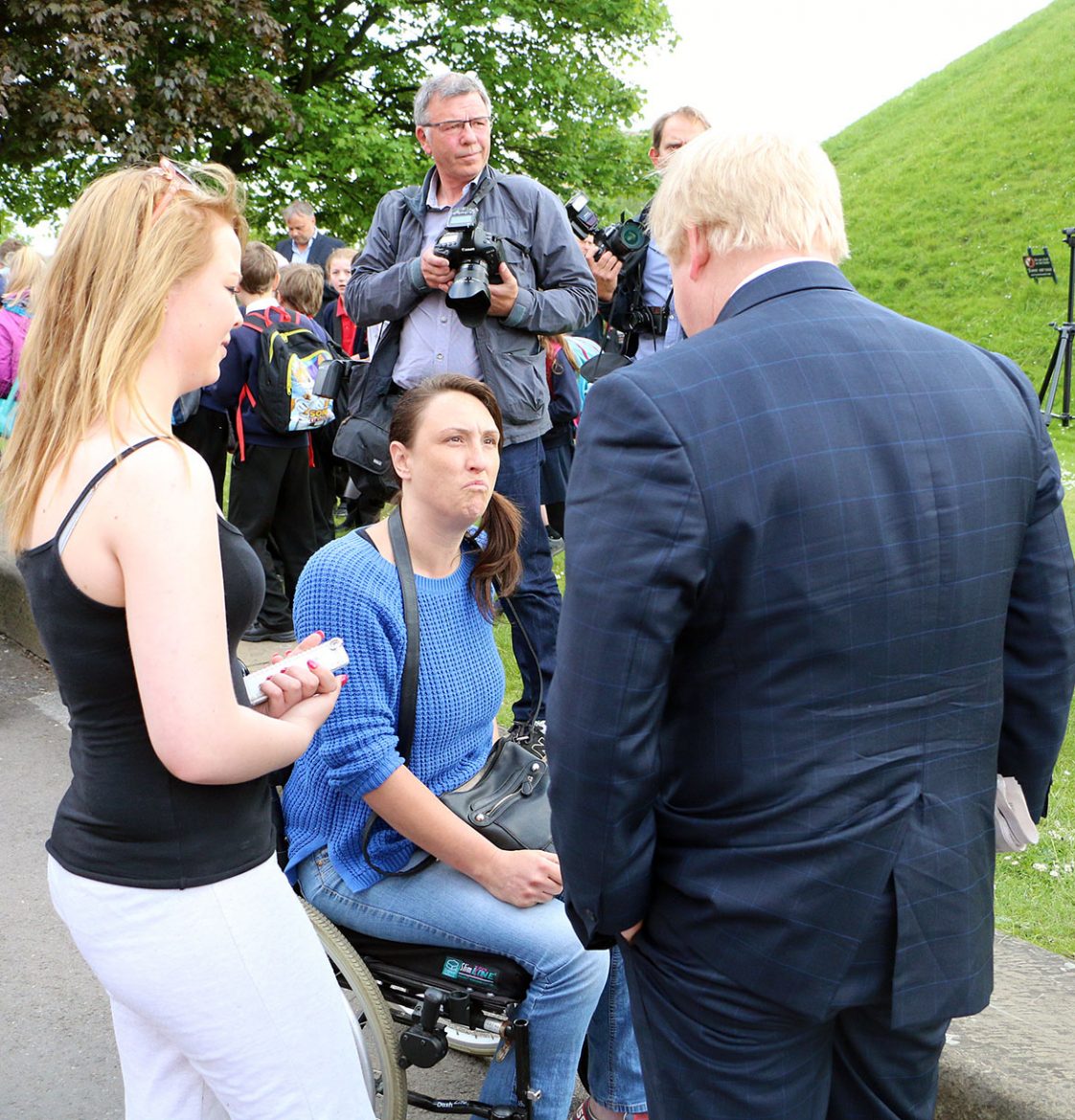 A supporter talks to the campaigner
