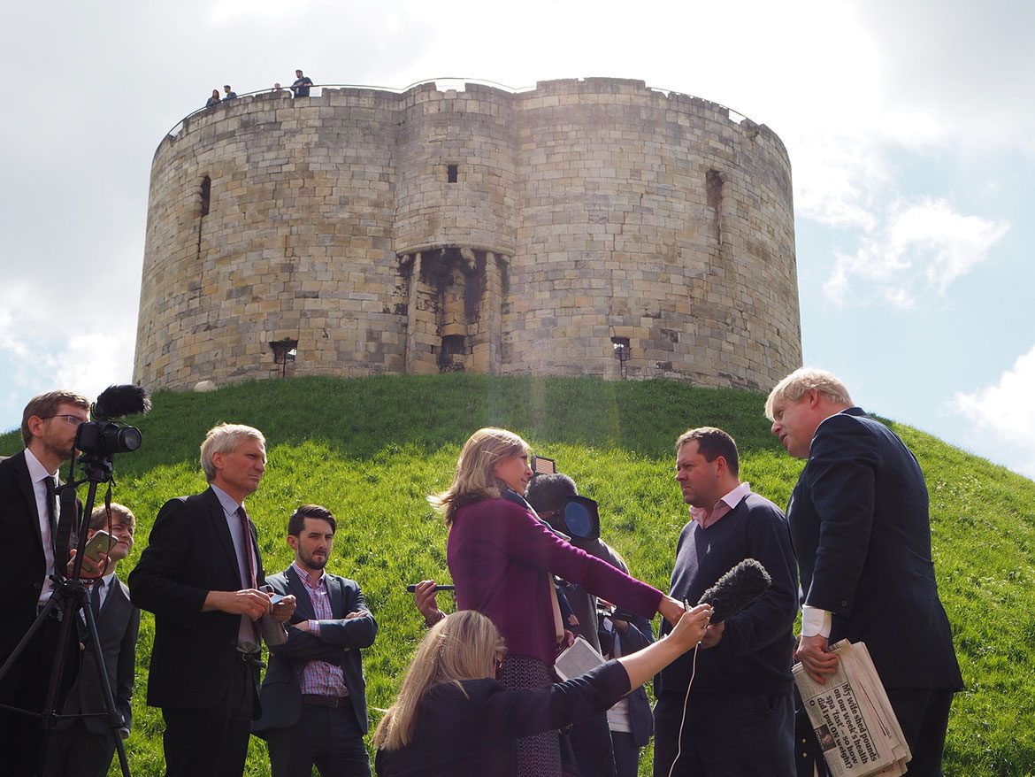 Talking to the media beneath Clifford's Tower