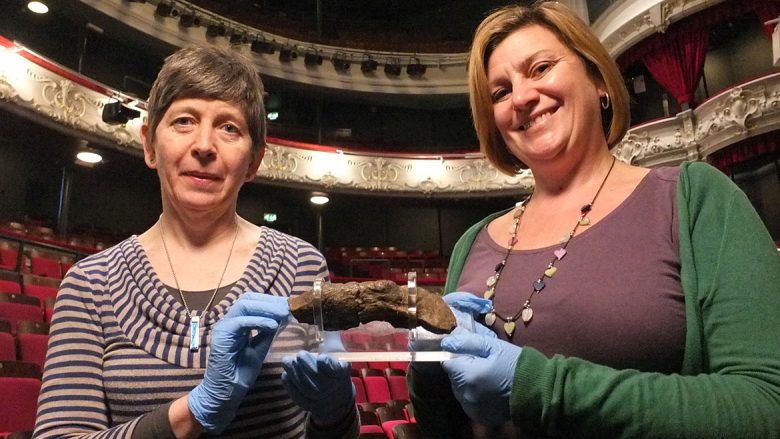 Liz Wilson and Sarah Maltby with a piece of Viking coprolite - fossilised poo - that will feature in the exhibition