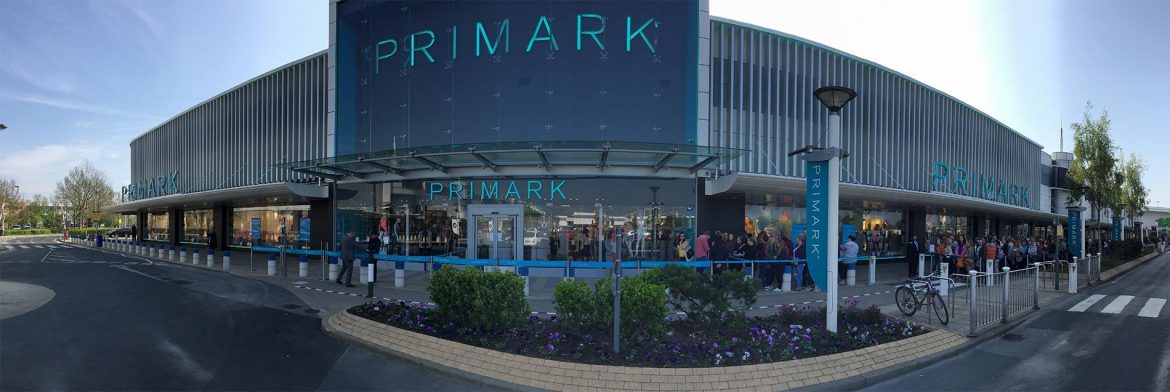 The first shoppers queue for bargains