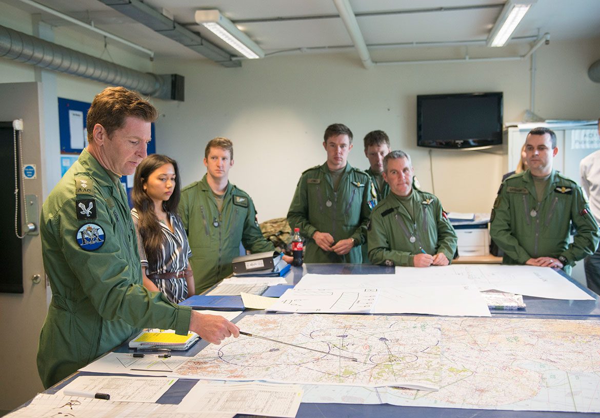 Commanding Officer of 9 AAC, Lieutenant Colonel Jeremy Cook OBE AAC goes through the flight plan with the crews of the Lynx helicopter
