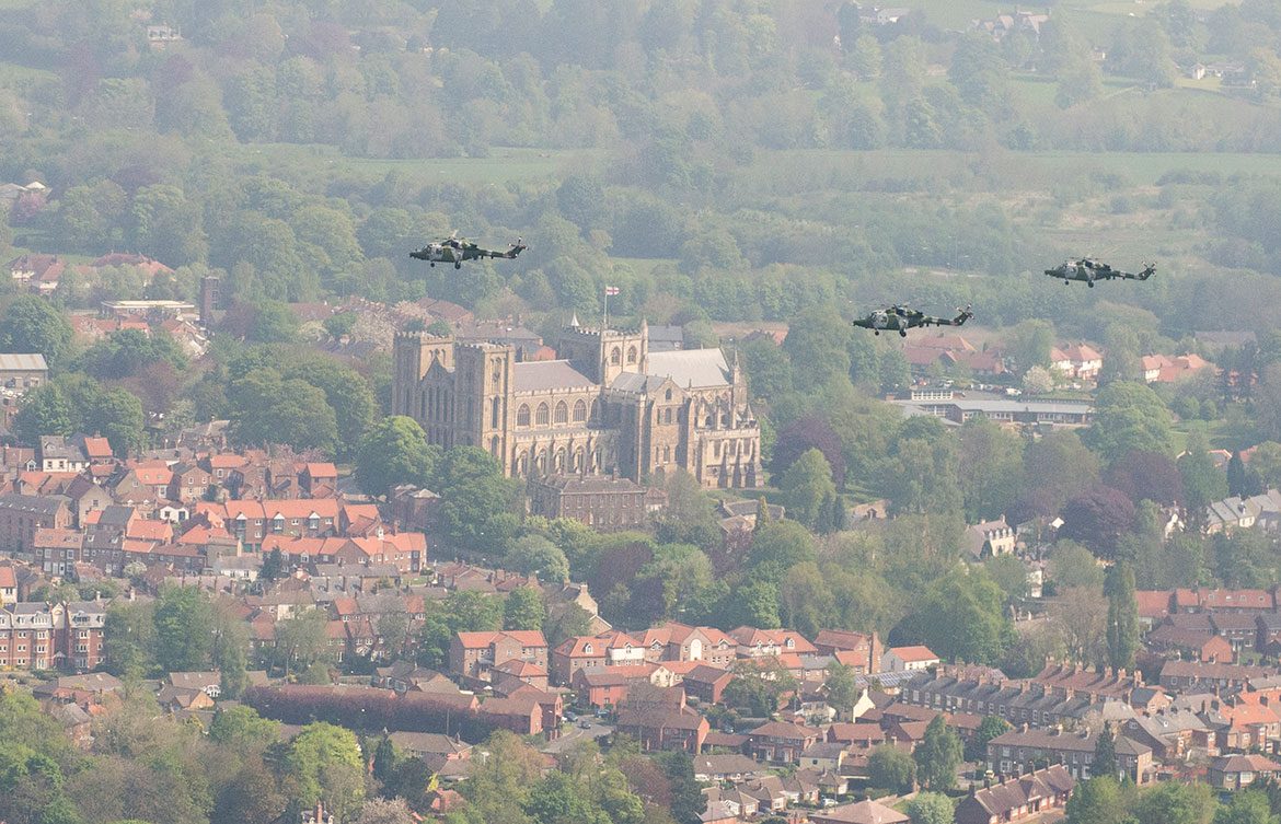 Three of the Lynx helicopters flying over Ripon cathedral