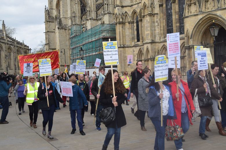 The mental health march passes York Minster