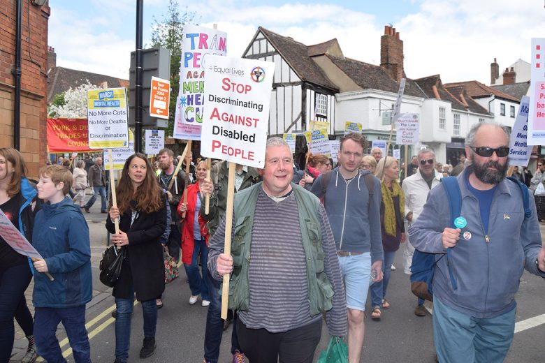 The demonstration moves through the city centre