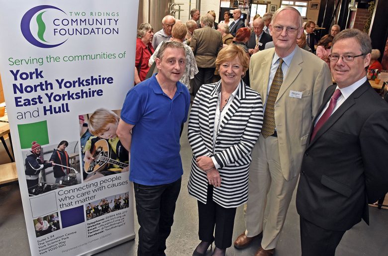 CEO Dame Fiona Kendrick meeting a flood victim. Photo: Nigel Holland