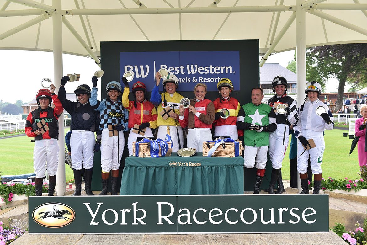 The happy ten riders in the Best Western Hotels & Macmillan Ride of their Lives celebrate on the podium. Photograph: Jeremy Phillips