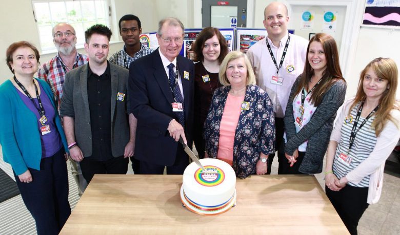Cutting the rainbow cake at York council HQ