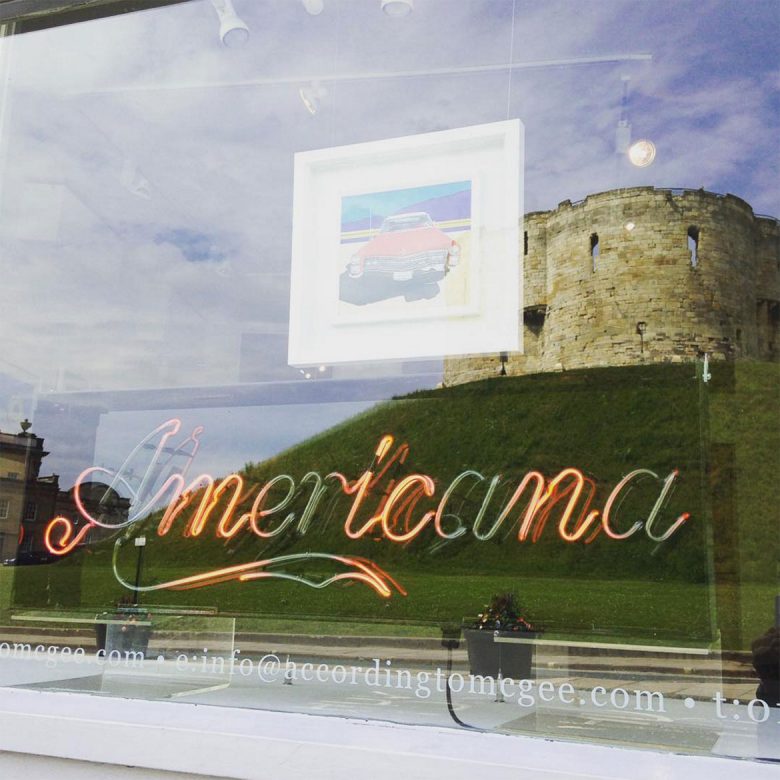 Reflecting the city… the window of the gallery