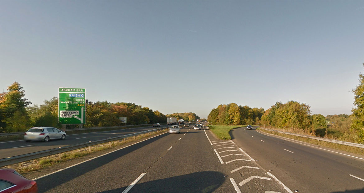 Man arrested after cyclist, 71, seriously injured in collision with car on A64