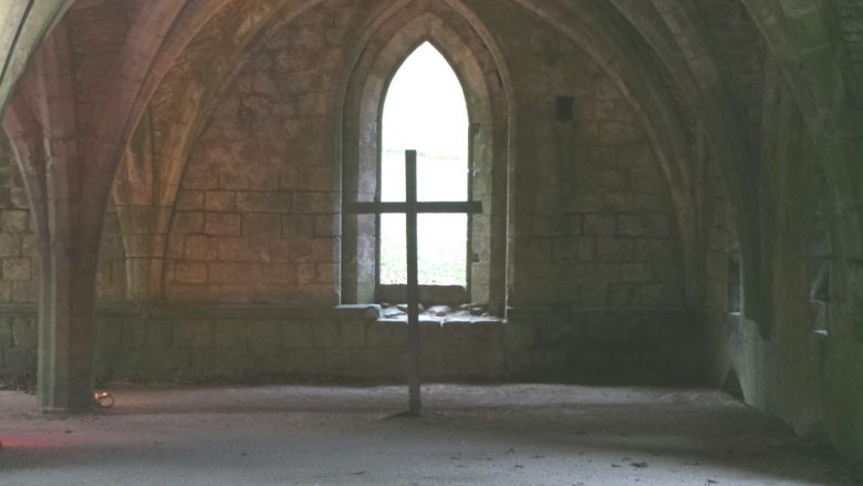 Fountains Abbey… but who is that shadowy figure to the right of the cross?