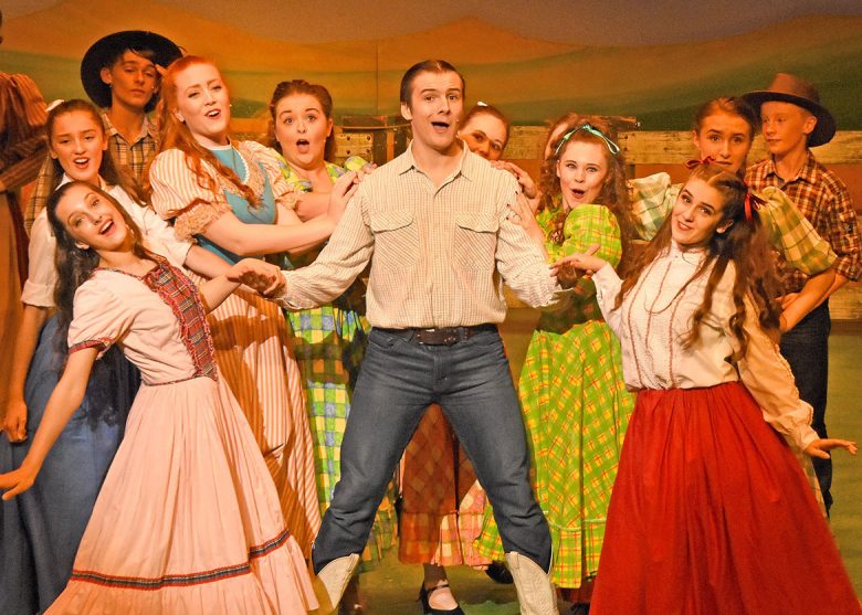 Will (Reece McMahon) leads one of the energetic dance numbers