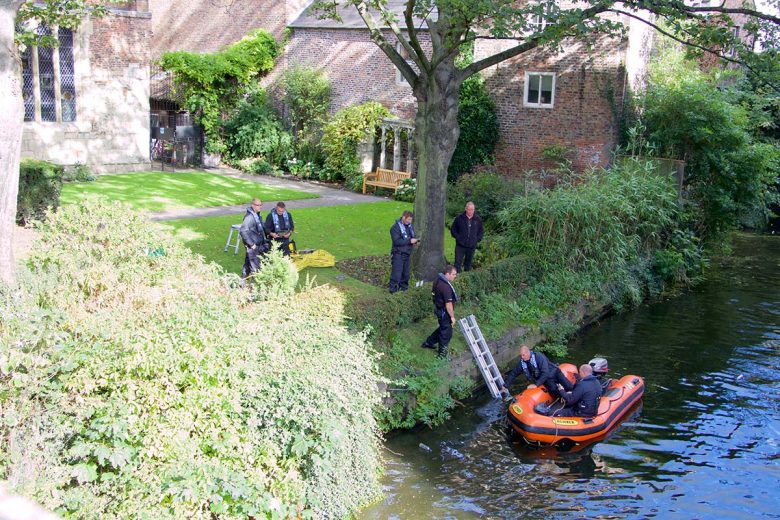 Another view of the police underwater team on the river at the back of the Merchant Adventurers' Hall