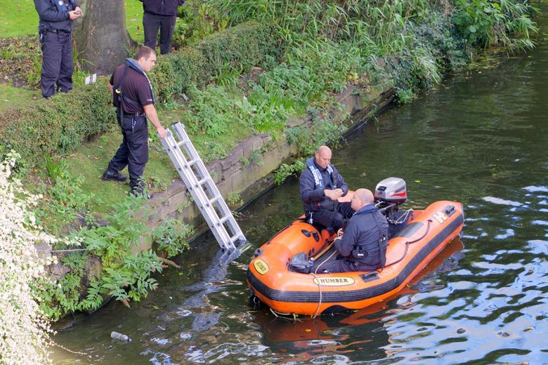 The police search team on the River Foss near Castle car park. Photograph: Richard McDougall