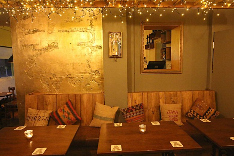 The cafe serves up breakfast and lunch and the bar becomes a pizzeria