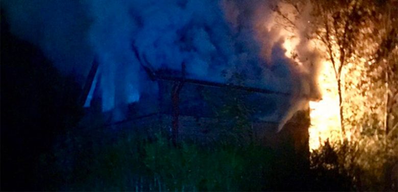 The lodge on fire. Photograph: Carl Nickson, Eboracum Security