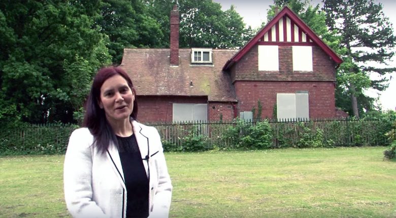 Jane Cullen, founder of the West Bank Park Heritage Project, outside the park-keeper's lodge in a still from the campaign video