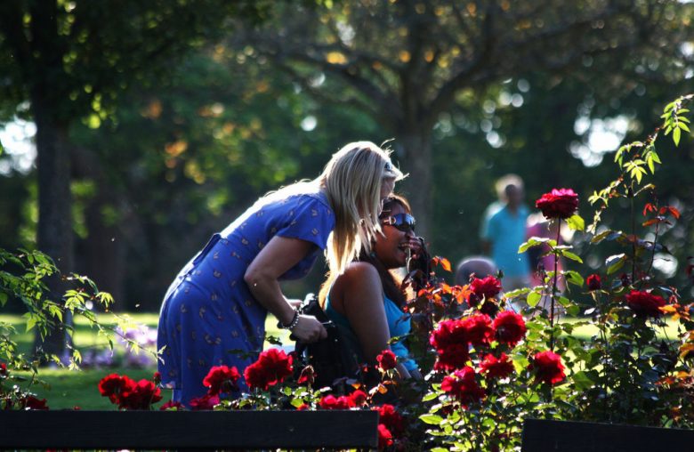 A woman in a wheelchair shares a lighter moment with her companion. Photograph © Gareth Williams on Flickr