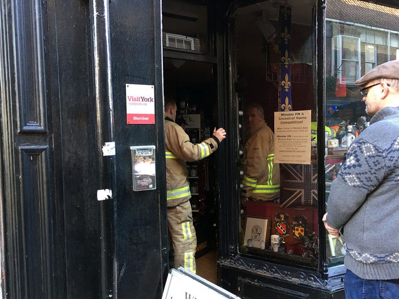 Firefighters inside Ancestral Name on Church Street